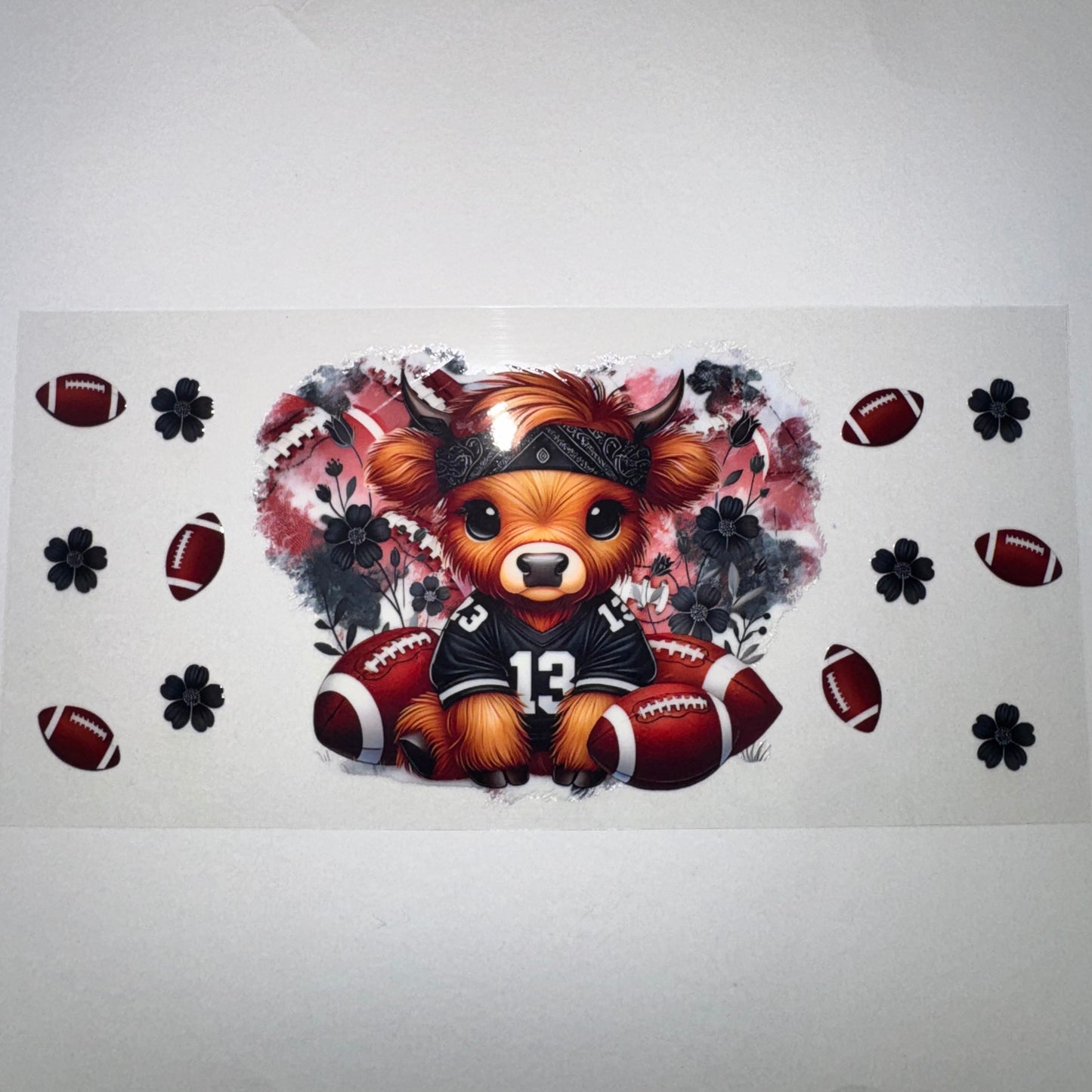 #717 - Football Highland Cow